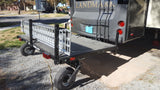 Swivelwheel Transport System, Swivelwheel Carrier, Swivelwheel Hauler, motorcycle carrier, scooter carrier, motorcycle hauler, scooter hauler, quickie mini golf cart hauler, quickie mini golf cart carrier, cricket mini golf cart carrier,cricket mini golf cart hauler,dirt bike hauler, dirt bike carrier, carrier, golf cart hauler, golf cart carrier, ATV hauler, ATV carrier, Swivelwheel DW58, motorcycle, motor home, fifth wheels, can-am carrier, can-am hauler, trike carrier, trike hauler, mobility Hauler