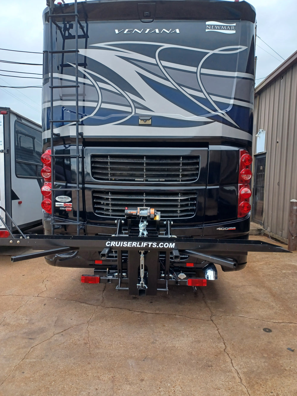 Cruiserlift Motorcycle Lift, Motorcycle Lift, Motorcycle Carrier, Motorcycle Hauler, Motorcycle, Motorhome, RV Motorcycle lift, RV Lift, RV Electric Motorcycle Lift, RV, Electric Motorcycle Lift, Harley, Honda, Victory, Yamaha, Winch Lift, Bikes, Bike Lift