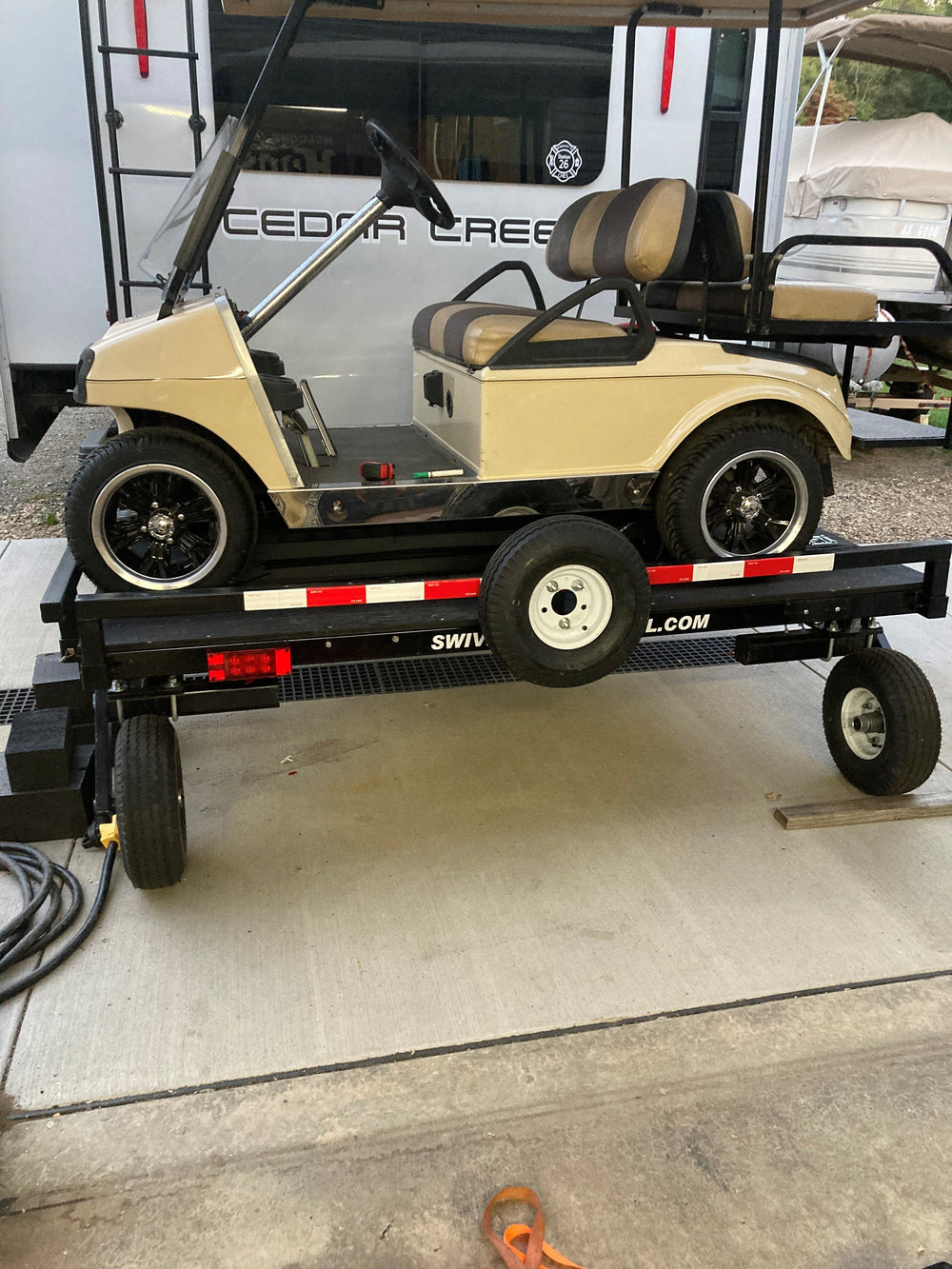 Swivelwheel Transport System, Swivelwheel Carrier, Swivelwheel Hauler, motorcycle carrier, scooter carrier, motorcycle hauler, scooter hauler, quickie mini golf cart hauler, quickie mini golf cart carrier, cricket mini golf cart carrier,cricket mini golf cart hauler,dirt bike hauler, dirt bike carrier, carrier, golf cart hauler, golf cart carrier, ATV hauler, ATV carrier, Swivelwheel DW58, motorcycle, motor home, fifth wheels, can-am carrier, can-am hauler, trike carrier, trike hauler, mobility Hauler 