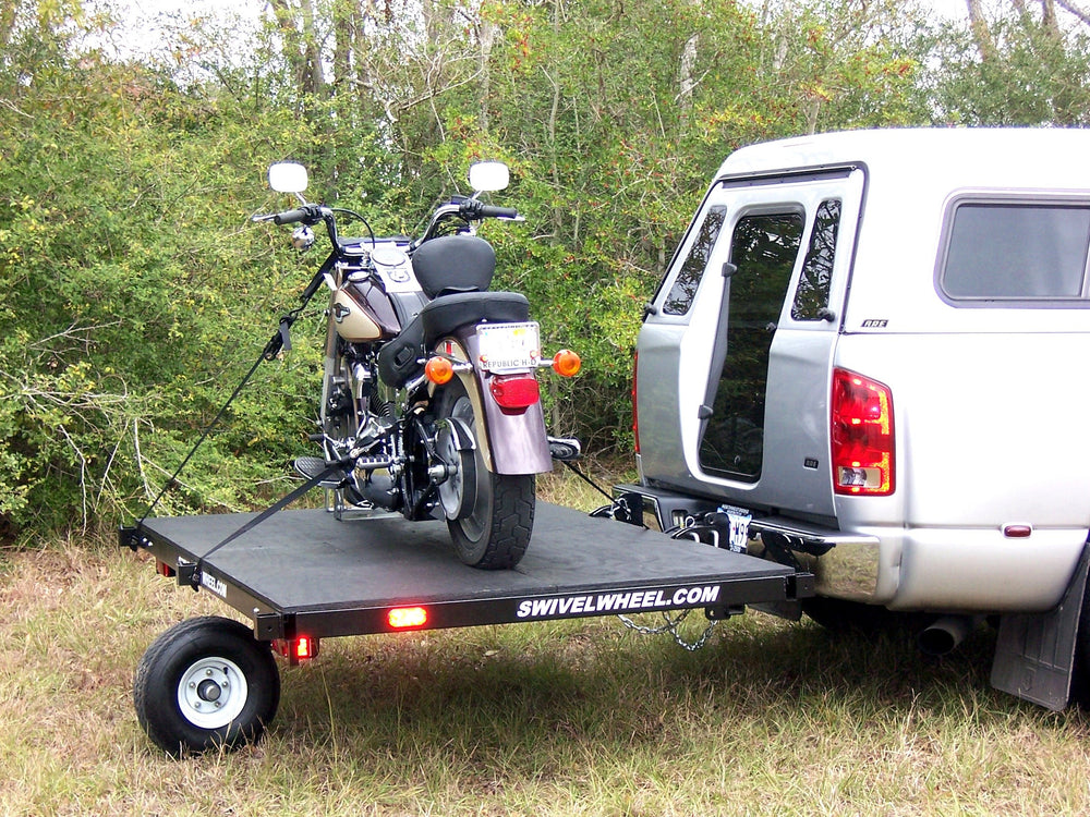 Swivelwheel Transport System,Swivelwheel Carrier, Swivelwheel Hauler, Motorcycle Carrier, scooter carrier, motorcycle hauler, scooter hauler, golf cart hauler, golf cart carrier, mini golf cart hauler, mini golf cart carrier, quickie mini golf cart hauler, quickie mini golf cart carrier, cricket mini golf cart carrier, cricket mini golf cart hauler, dirt bike hauler, dirt bike carrier, carrier, hauler, ATV hauler, ATV carrier, single wheel, sivelwheel 58, motorcycle, motor home, fifth wheels