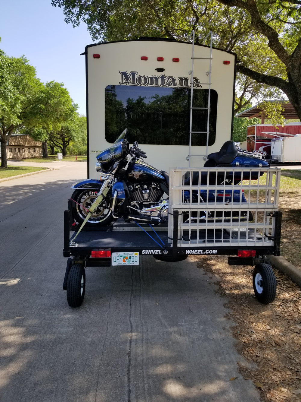 Swivelwheel Transport System, Swivelwheel Carrier, Swivelwheel Hauler, motorcycle carrier, scooter carrier, motorcycle hauler, scooter hauler, quickie mini golf cart hauler, quickie mini golf cart carrier, cricket mini golf cart carrier,cricket mini golf cart hauler,dirt bike hauler, dirt bike carrier, carrier, golf cart hauler, golf cart carrier, ATV hauler, ATV carrier, Swivelwheel DW58, motorcycle, motor home, fifth wheels, can-am carrier, can-am hauler, trike carrier, trike hauler, mobility Hauler 