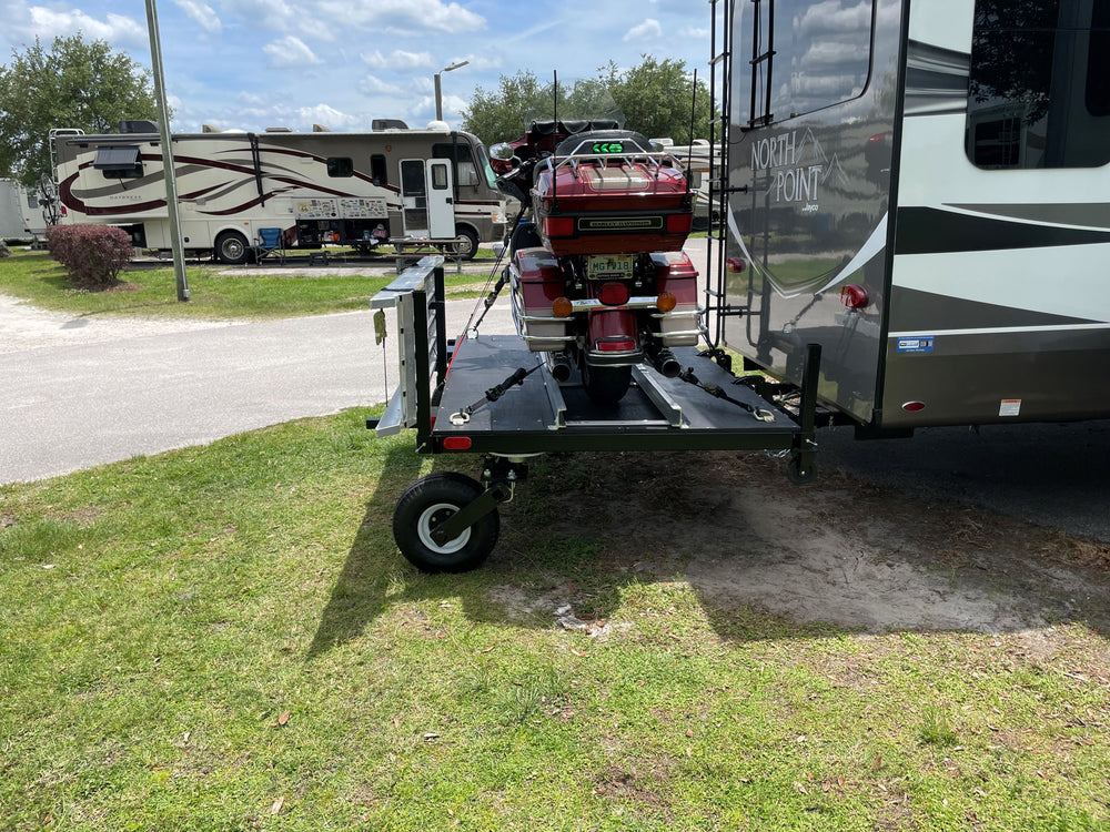 Swivelwheel Transport System, Swivelwheel Carrier, Swivelwheel Hauler, motorcycle carrier, scooter carrier, motorcycle hauler, scooter hauler, quickie mini golf cart hauler, quickie mini golf cart carrier, cricket mini golf cart carrier,cricket mini golf cart hauler,dirt bike hauler, dirt bike carrier, carrier, golf cart hauler, golf cart carrier, ATV hauler, ATV carrier, Swivelwheel DW58, motorcycle, motor home, fifth wheels, can-am carrier, can-am hauler, trike carrier, trike hauler, mobility Hauler 