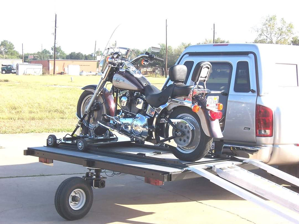 Swivelwheel Transport System,Swivelwheel Carrier, Swivelwheel Hauler, Motorcycle Carrier, scooter carrier, motorcycle hauler, scooter hauler, golf cart hauler, golf cart carrier, mini golf cart hauler, mini golf cart carrier, quickie mini golf cart hauler, quickie mini golf cart carrier, cricket mini golf cart carrier, cricket mini golf cart hauler, dirt bike hauler, dirt bike carrier, carrier, hauler, ATV hauler, ATV carrier, single wheel, sivelwheel 58, motorcycle, motor home, fifth wheels